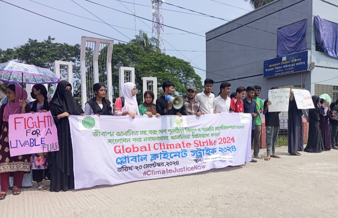 "Members of the Brotherhood Social Welfare Youth & Sports Organization (BSB) lead a Global Climate Strike in Kathalia, raising awareness about the harmful effects of climate change and demanding action to reduce carbon emissions." Photo: V7N